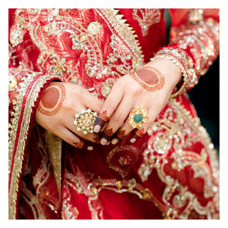 Gold plated silver mix base metal kundan ring. The ring has hand-painted meenakari work at the back.