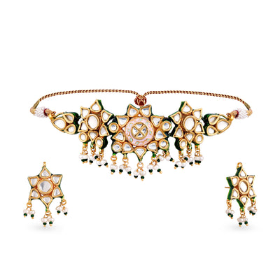 Gold plated silver mix base metal kundan choker and earrings set with real pearls and pink meena work. The set has handpainted meenakari work at the back of the set.