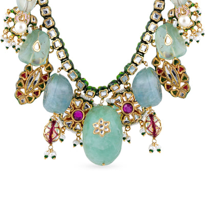 Gold plated silver mix base metal kundan necklace and earrings set with real pearls and Fluorite . The set has hand-painted meenakari work at the back.