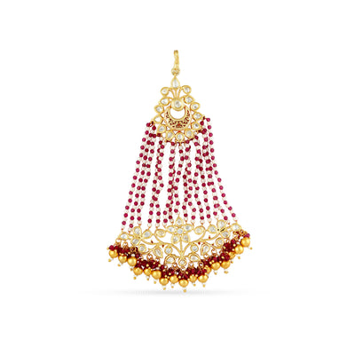 Gold plated jhumar with red beads and faux pearls.