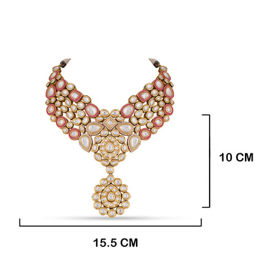 Make your style unique with polki, meenakari work and kundan choker set. Paired with matching earrings and a maang tikka.